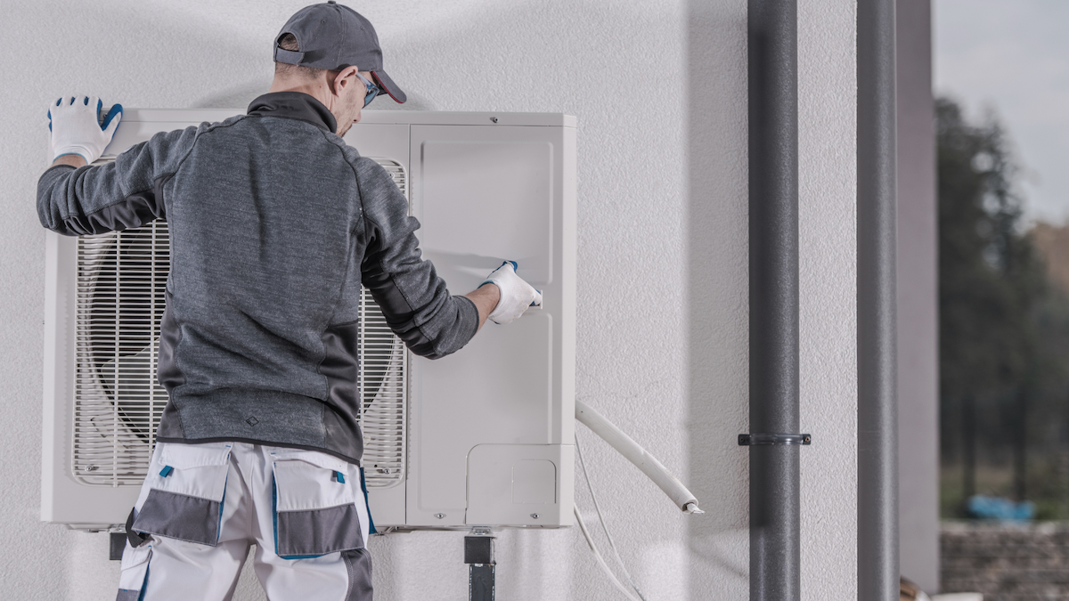 Heat pump installer at work