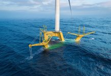 Gazelle Wind Power develops breakthrough floating platform design for 18MW+ wind turbines in extreme conditions Gazelle Wind Power floating offshore wind platform at sea, yellow articulated frame structure with wind turbine, mild sea conditions.